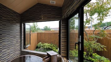 Deluxe Apartment, Balcony, Mountain View | Bathroom | Separate tub and shower, spring water tub, free toiletries, hair dryer