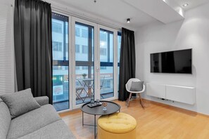 Flat-screen TV, offices - Central & Modern Apartment Reykjavik with balcony 204 (Reykjavík)