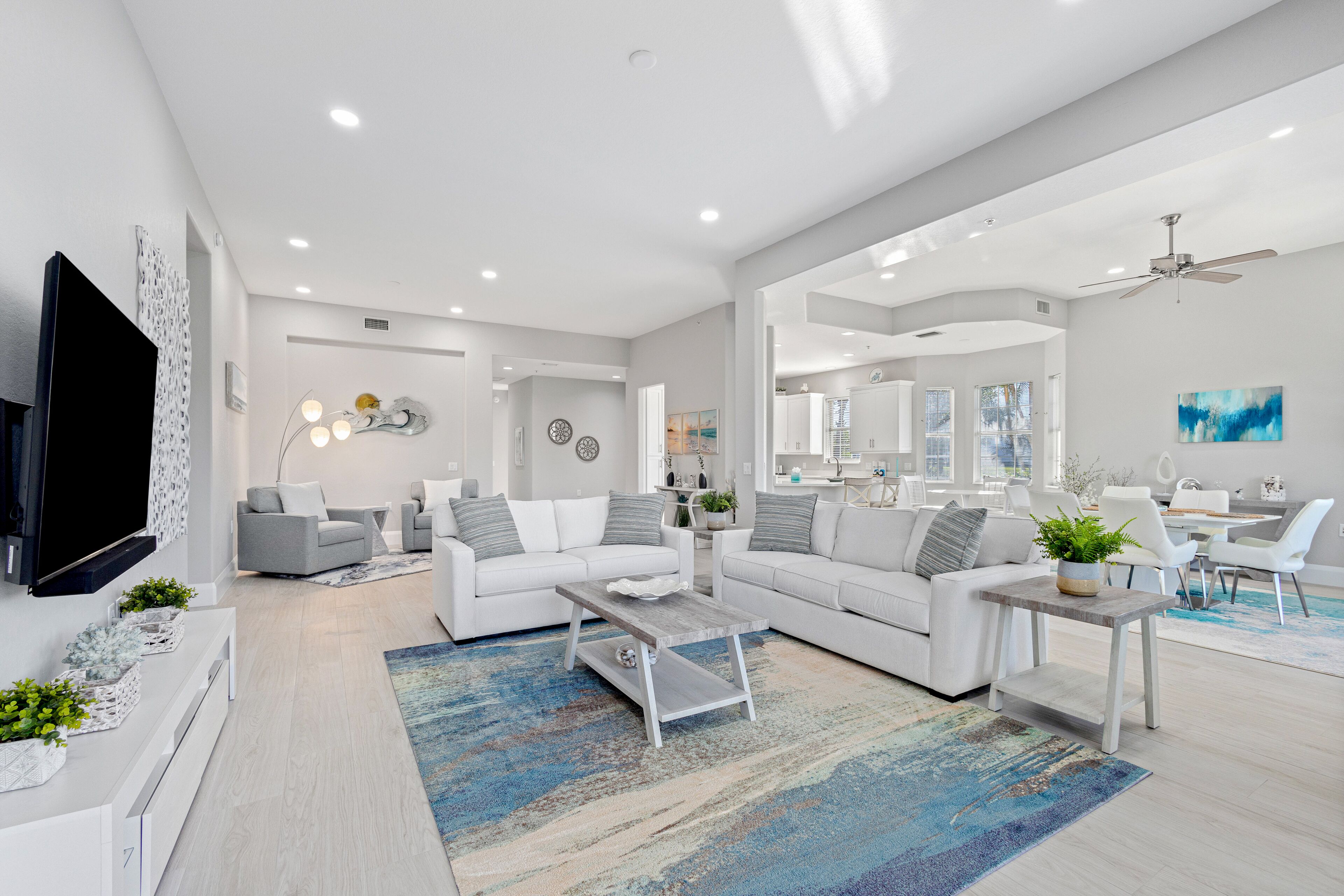 Luxe waterfront condo with pool & tennis access - sunroom, AC, jetted tub, & W/D