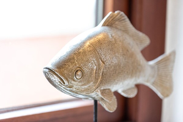 A fish mounted on a wall.