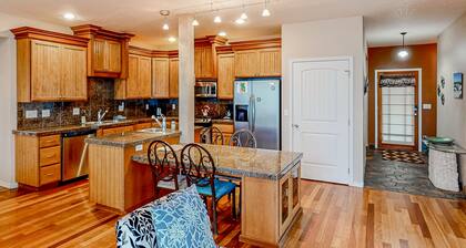 Dog-friendly sound-front cottage with fireplace, deck, lawn, beach access, & W/D