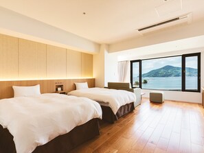Deluxe Twin Room, Non Smoking, Private Bathroom (Accessible bath) | Down comforters, in-room safe, soundproofing, free WiFi - Etajimasou (Etajima)