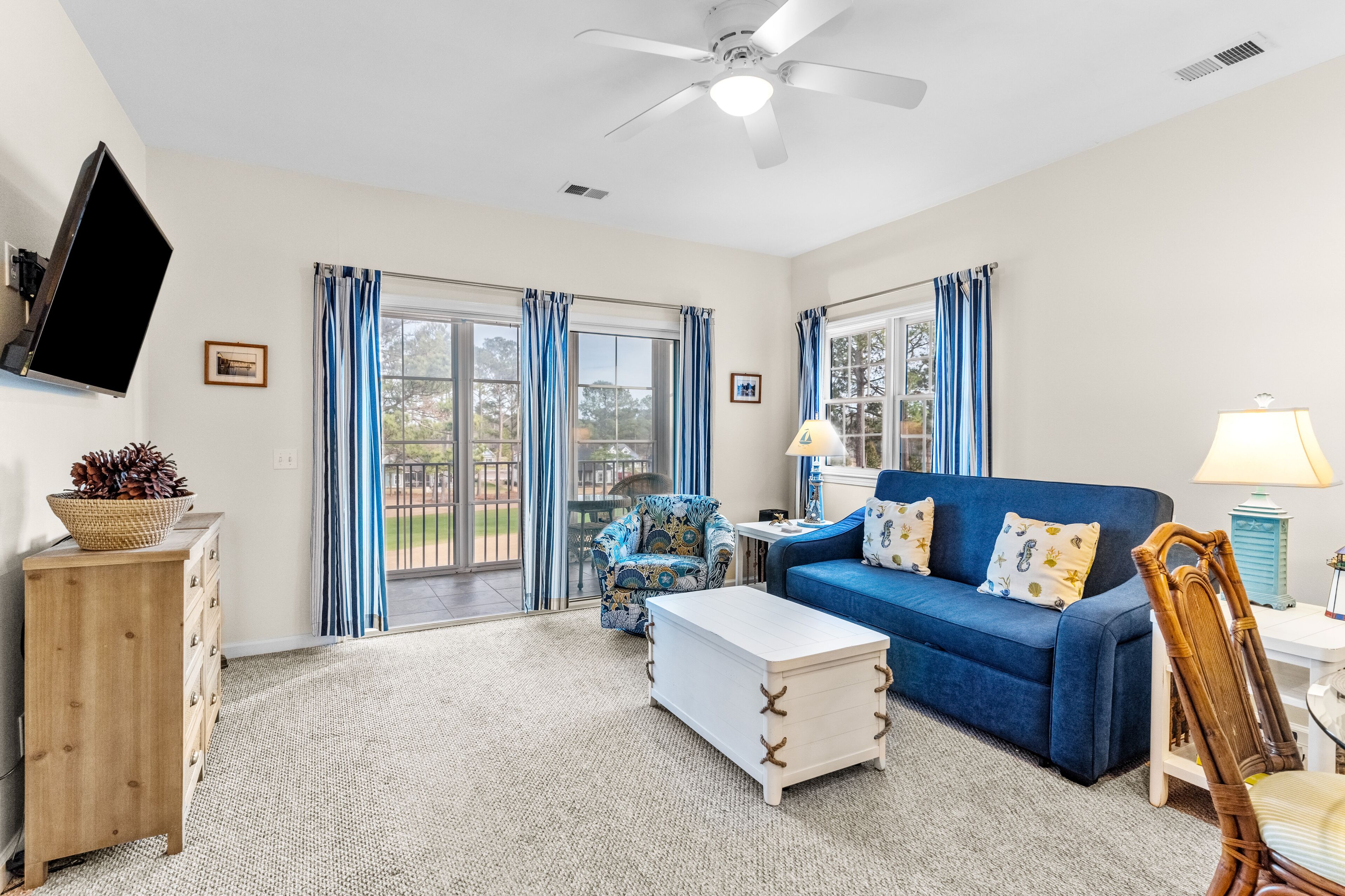 Dog-friendly, golf course condo with screened balcony & pool access - near beach