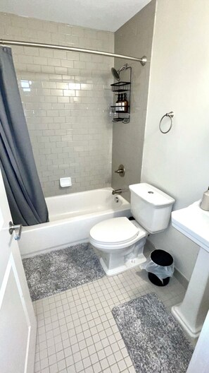 Hair dryer, towels, soap, shampoo