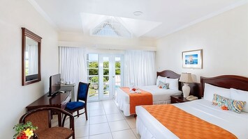 Unit with 2 Double Beds. Exact unit will be assigned upon arrival. Views, colors and decor may vary.