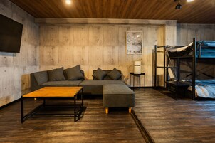 Quadruple Room, 4 Bedrooms | Down comforters, iron/ironing board, free WiFi, bed sheets