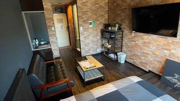 Quadruple Room, 4 Bedrooms | Down comforters, iron/ironing board, free WiFi, bed sheets