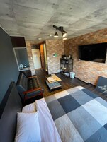 Quadruple Room, 4 Bedrooms | Down comforters, iron/ironing board, free WiFi, bed sheets