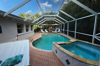 The Utopia Resort Heated Pool Spa Waterfall BBQ Studio and more Hosted by Relaxtay