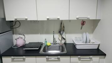 Fridge, microwave, cookware/dishes/utensils