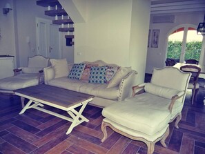 TV, fireplace, books