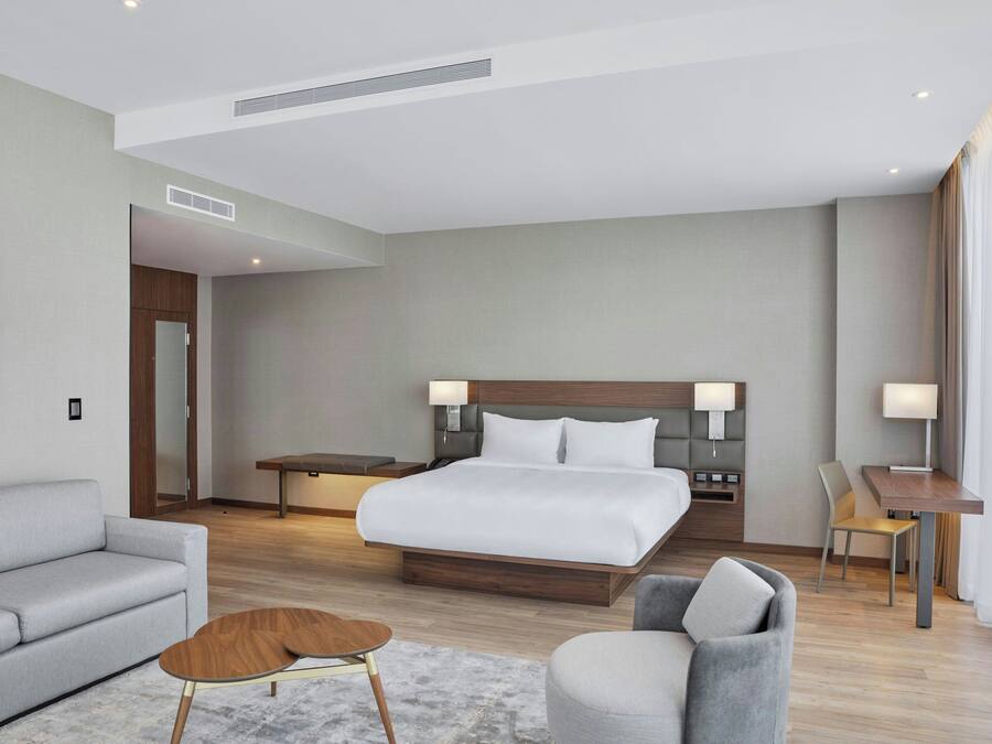 Suite, 1 Bedroom, City View | Desk, laptop workspace, free WiFi, bed sheets