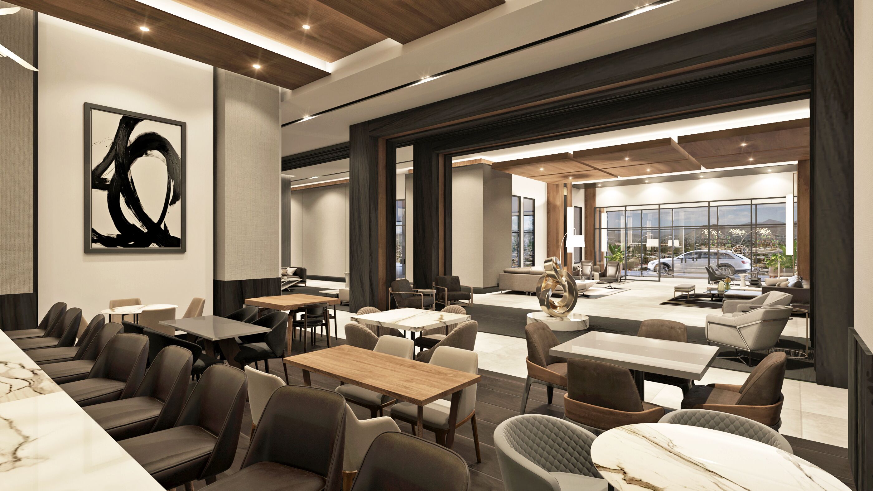 Un restaurant moderne offrant différents types de sièges, notamment des tables et des chaises, et orné d’un grand tableau abstrait au mur.