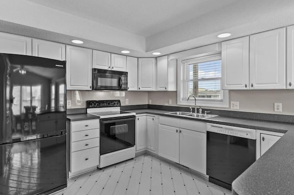 Fridge, microwave, oven, dishwasher - Life of Sea-Renity / 112 Burlington Street - Canal home with private dock! (Holden Beach)