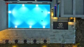 Seasonal outdoor pool, pool umbrellas, pool loungers