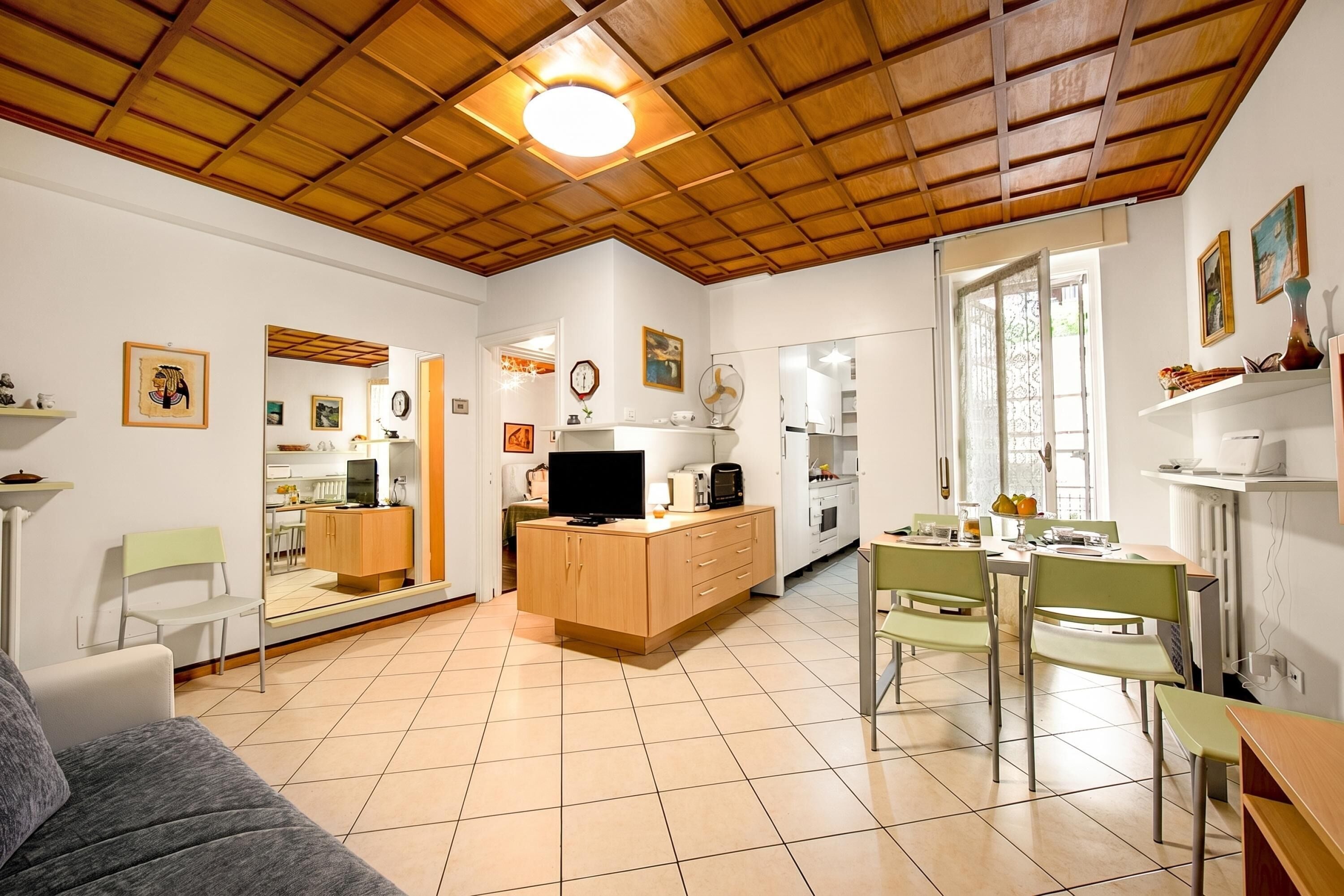 Family Apartment, Multiple Bedrooms (Il Sogno Di Silvana) | Living area | 21-inch TV with cable channels