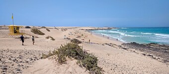 Vacation Apartment 'Dunes To Explore and Relax' with Shared Pool, Private Terrace and Wi-Fi