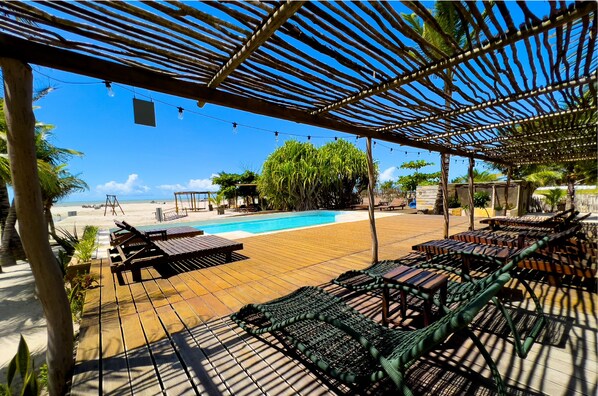Outdoor pool, open 8:00 AM to 10:00 PM, free pool cabanas, pool loungers