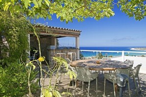 Outdoor dining - Magnificent modern villa with panoramic sea view and swimming pool (Algajola)