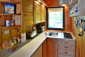 Fridge, stovetop, coffee/tea maker, electric kettle