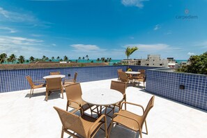 Apartamento conforto | Opções para refeição ao ar livre