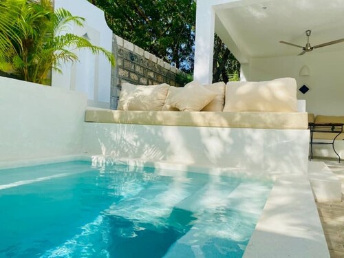 Cashew Nut Cottage- Spacious comfort for two in a private villa with a pool.