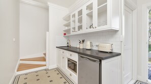 Fridge, microwave, coffee/tea maker, toaster
