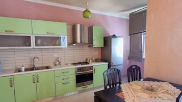 Apartment | Private kitchen | Fridge, microwave, oven, stovetop