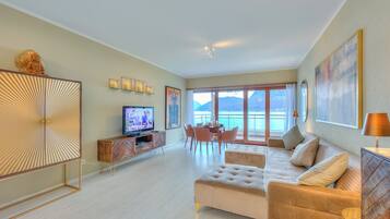 Family Apartment, 2 Bedrooms, Lakeside (Emotion Lake View) | Living room | 21-inch flat-screen TV with cable channels