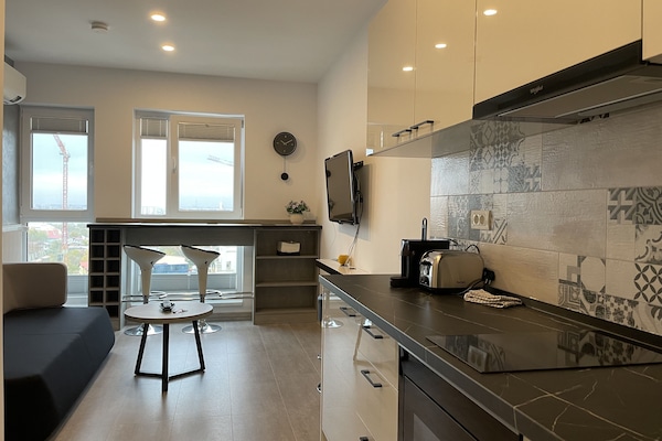 Apartamento exclusivo | Zona de estar | Una Smart TV, una consola de videojuegos, Netflix, películas de pago