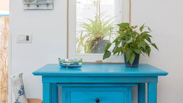 Deluxe Studio | Living area | 20-inch Smart TV with satellite channels, TV