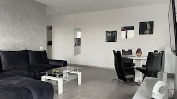 Apartamento panorámico | Zona de estar | Una Smart TV, Netflix, películas de estreno, películas de pago
