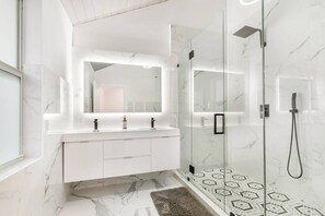 Bathtub, hair dryer, towels, soap
