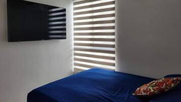 2 dormitorios, caja fuerte, tabla de planchar con plancha y wifi gratis