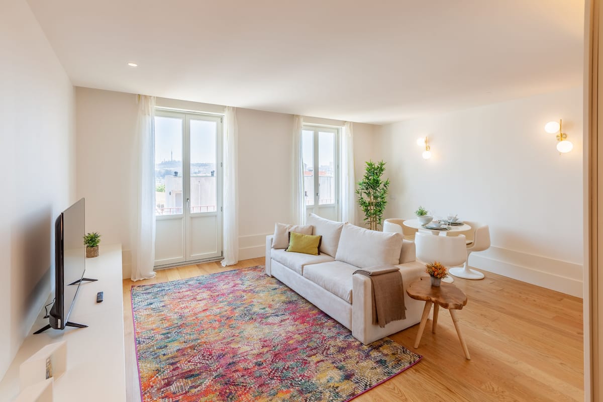 Premium Studio | Living area | 55-inch Smart TV with cable channels, TV