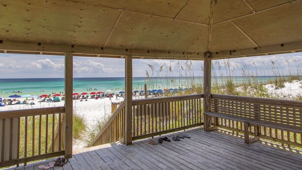 A wooden beach pavilion with a view of the beach and ocean. - Sea Cabins 2B - Newly Renovated, Heated Community Pool, Deeded Beach Access! (Miramar Beach)