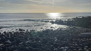 Una spiaggia nelle vicinanze, teli da spiaggia