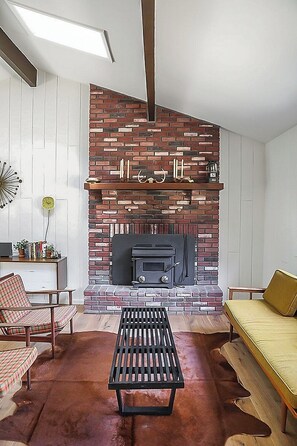 Fireplace, books - Private Riverfront Catskills Retreat w/ Hot Tub (Tusten)