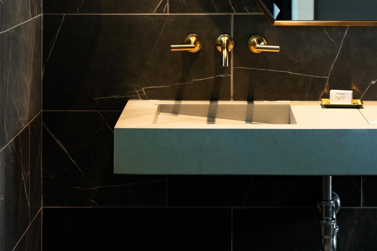 Shower, designer toiletries, hair dryer, bathrobes