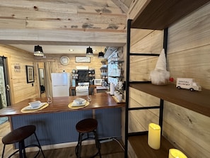 Fridge, microwave, stovetop, coffee/tea maker