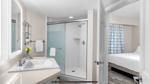 Shower, jetted tub, hair dryer, towels