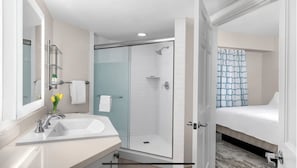 Shower, jetted tub, hair dryer, towels
