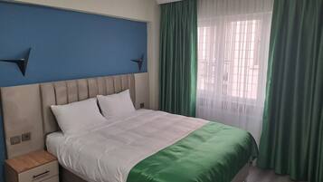 Comfort Condo | Egyptian cotton sheets, premium bedding, down comforters, in-room safe
