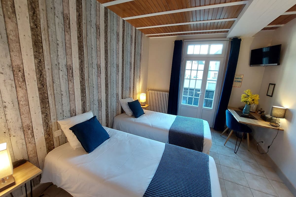 Twin kamer, 2 eenpersoonsbedden | Luxe beddengoed, individueel gedecoreerd, individueel gemeubileerd