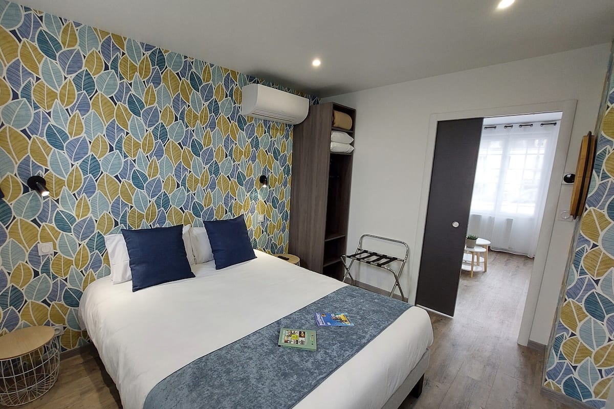Estudio familiar, 1 cama Queen size y sofá cama | Ropa de cama de alta calidad y decoración personalizada