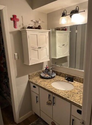 Shower, eco-friendly toiletries, hair dryer, towels