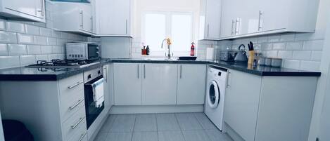 Apartment, Multiple Beds | Private kitchen