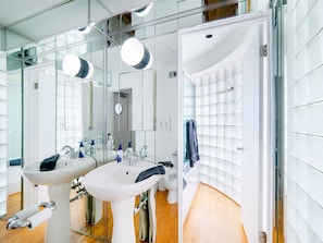 Bathtub, hair dryer, towels