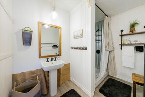 Bathtub, hair dryer, towels