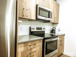 Réfrigérateur, micro-ondes, four, lave-vaisselle